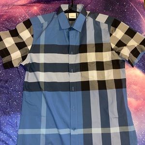 Burberry button down shirt. Size Large but fits like a medium.